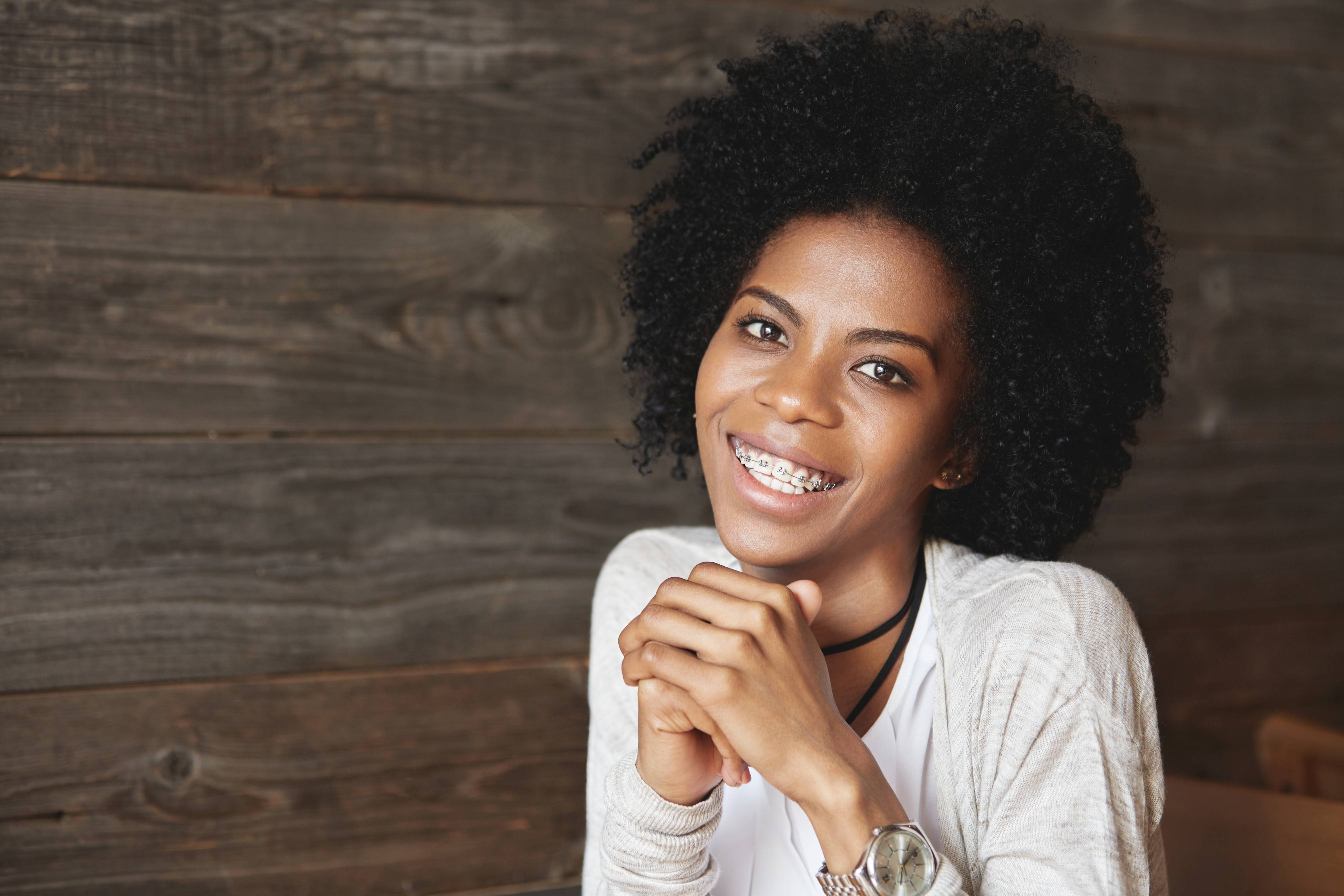 young-african-american-woman-sitting-cafe-1
